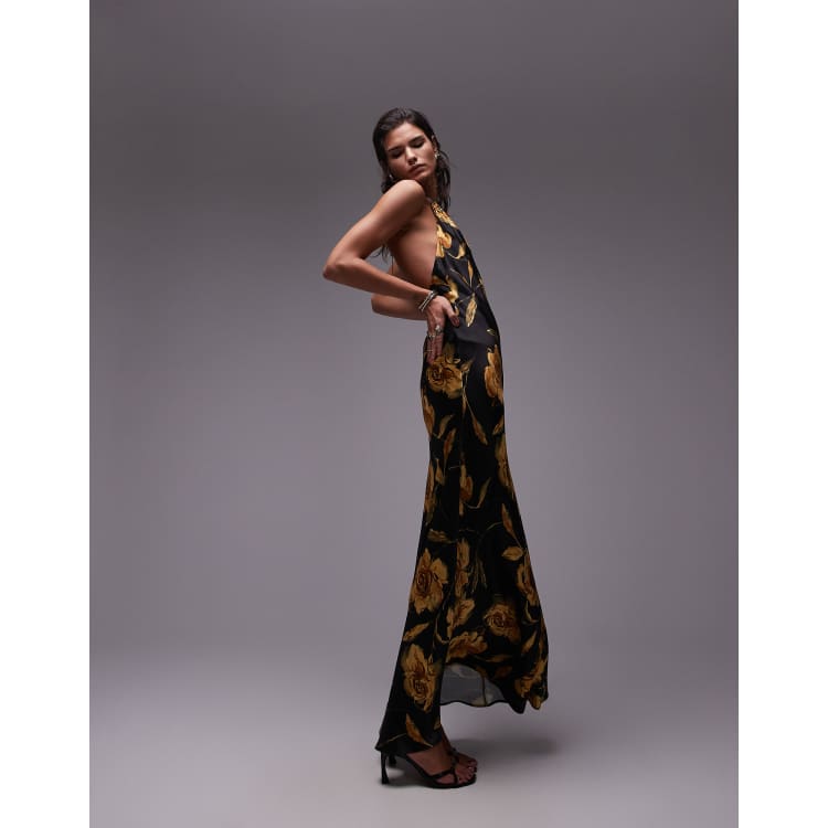 Black and gold halter neck dress hotsell