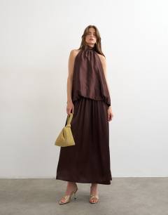 Model wearing Halter neck voluminous blouson maxi dress in chocolate