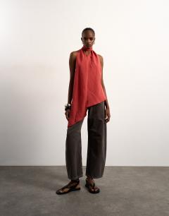 Model wearing Halter scarf detail top in rust