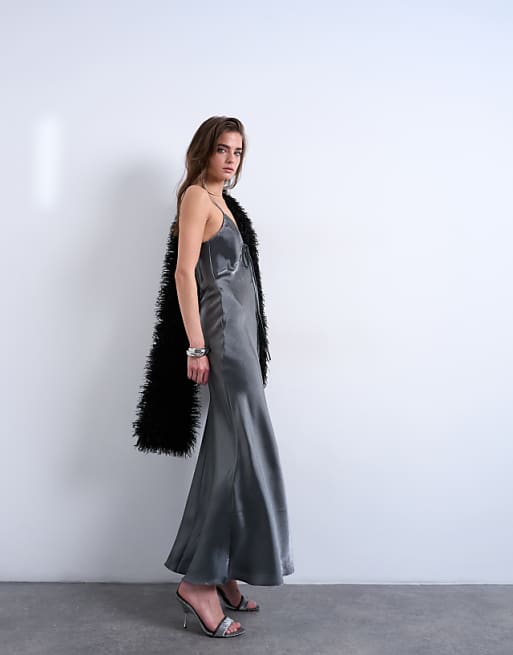 liquid metallic dress Heidi Klum Gleams in Metal at Fashion Trust Awards 2023 giving the silhouette a rich sense of motion and presence Topshop halter Tie neck liquid
