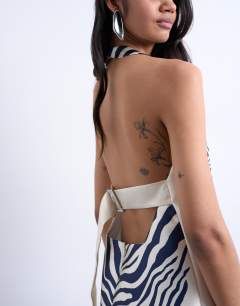 Model wearing Halterneck structured mini dress in zebra