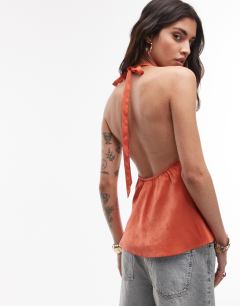Model wearing Halterneck top with contrast lace in deep orange