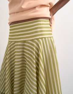 Model wearing Hanky hem mini skirt in green stripe