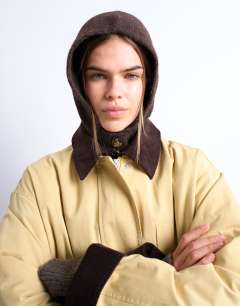 Model wearing Hayley button balaclava in chocolate