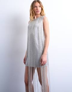 Model wearing Heavy beaded fringe mini dress in silver