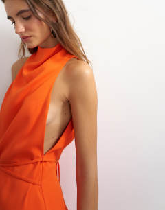 Model wearing Heavy crepe high cowl neck mini dress with tie waist in orange