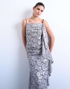 Model wearing Heavy foiled lace maxi dress in silver