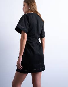 Model wearing Heavy twill contrast stitch short sleeve mini dress in black