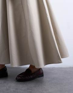 Model wearing Heavy twill full circle midi skirt in taupe