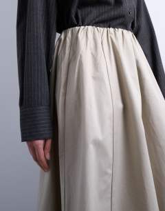 Model wearing Heavy twill full circle midi skirt in taupe