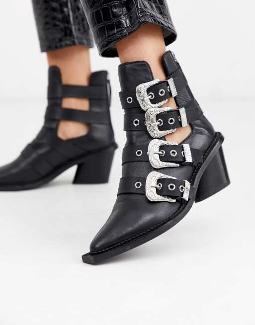 Heeled boots shop with buckles