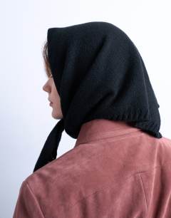 Model wearing Heidi hooded scarf in black