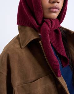 Model wearing Heidi hooded scarf in burgundy