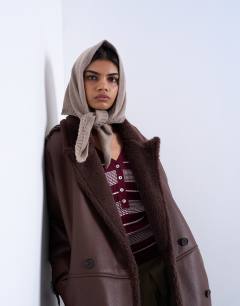 Model wearing Heidi hooded scarf in taupe 
