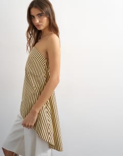 Model wearing High low bandeau top in buttermilk stripe