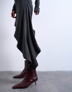 Model wearing High neck asymmetric hem mini dress in charcoal grey