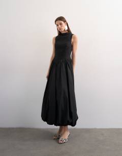 Model wearing High neck asymmetric waist bubble hem maxi dress in black