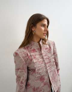 Model wearing High neck boxy jacquard jacket with frogging detail in pink