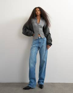 Model wearing High neck button down long sleeve rib top in grey marl