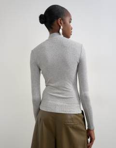 Model wearing High neck button rib long sleeve top in grey marl