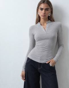 Model wearing High neck button rib long sleeve top in grey marl