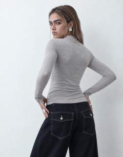 Model wearing High neck button rib long sleeve top in grey marl