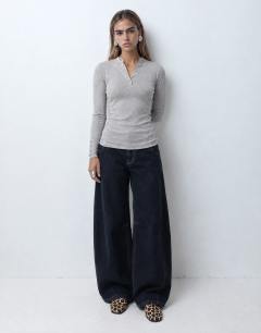 Model wearing High neck button rib long sleeve top in grey marl