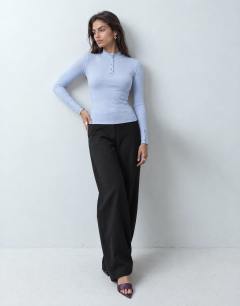 Model wearing High neck button rib long sleeve top in light blue