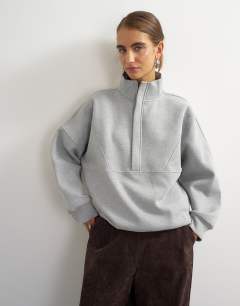 Model wearing High neck concealed placket sweat in grey marl