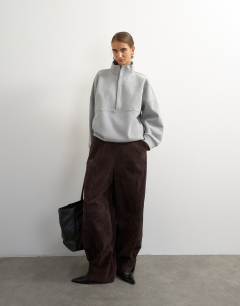 Model wearing High neck concealed placket sweat in grey marl