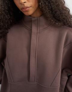Model wearing High neck concealed placket sweat in mocha