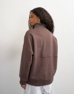 Model wearing High neck concealed placket sweat in mocha