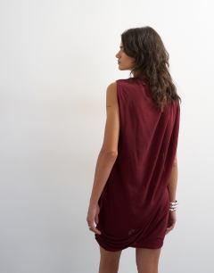 Model wearing High neck mesh draped mini dress in burgundy