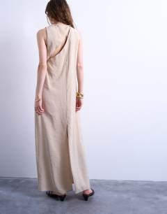 Model wearing High neck open back chuck on cupro midi dress in buttermilk