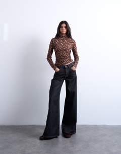 Model wearing High neck ruched check print long sleeve top in brown