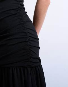 Model wearing High neck ruched maxi dress in black