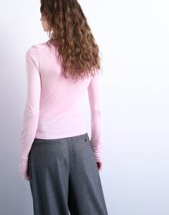Model wearing High neck viscose long sleeve top in pink