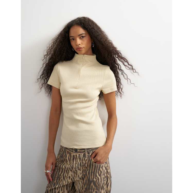 Topshop high neck zip through short sleeve rib top in cream | ASOS