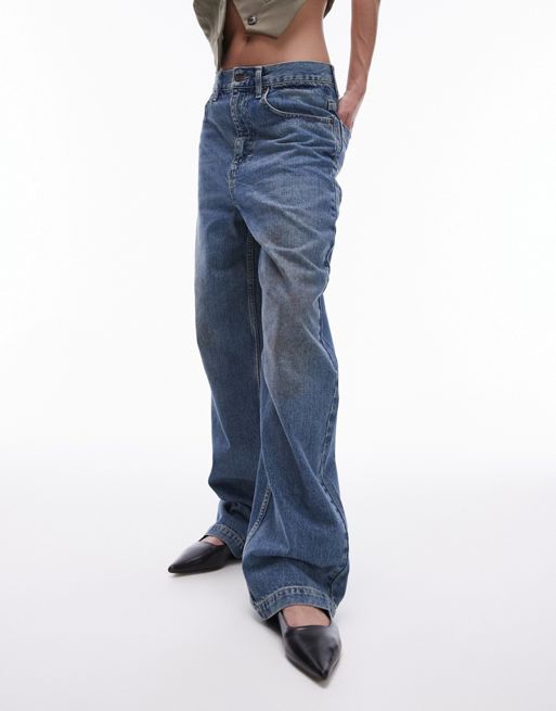 Topshop high rise baggy jeans with mud marks in mid blue