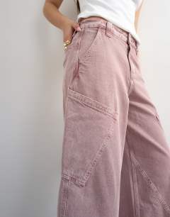 Model wearing High rise utility barrel jean in lilac