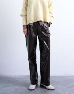 Model wearing High shine high waist faux leather pleated straight leg trouser  in brown