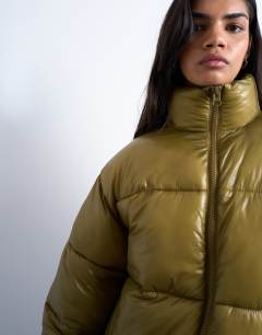 Model wearing High shine mid length funnel neck puffer jacket in khaki