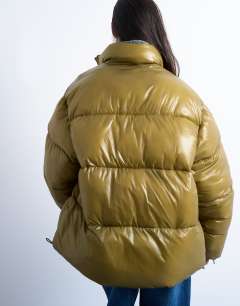 Model wearing High shine mid length funnel neck puffer jacket in khaki
