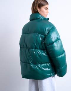 Model wearing High shine mid length funnel neck puffer jacket in teal