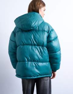 Model wearing High shine ripstop puffer jacket in teal