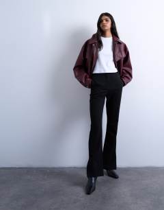 Model wearing High waisted split flare trouser in black