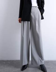 Model wearing High waisted two pleat tailored trouser in light grey