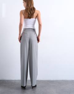 Model wearing High waisted two pleat tailored trouser in light grey