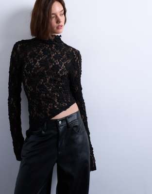 Topshop - Hochgeschlossenes, langärmliges Oberteil aus Spitze in Schwarz mit asymmetrischem Saum