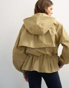 Model wearing Hooded cinch waist anorak in camel